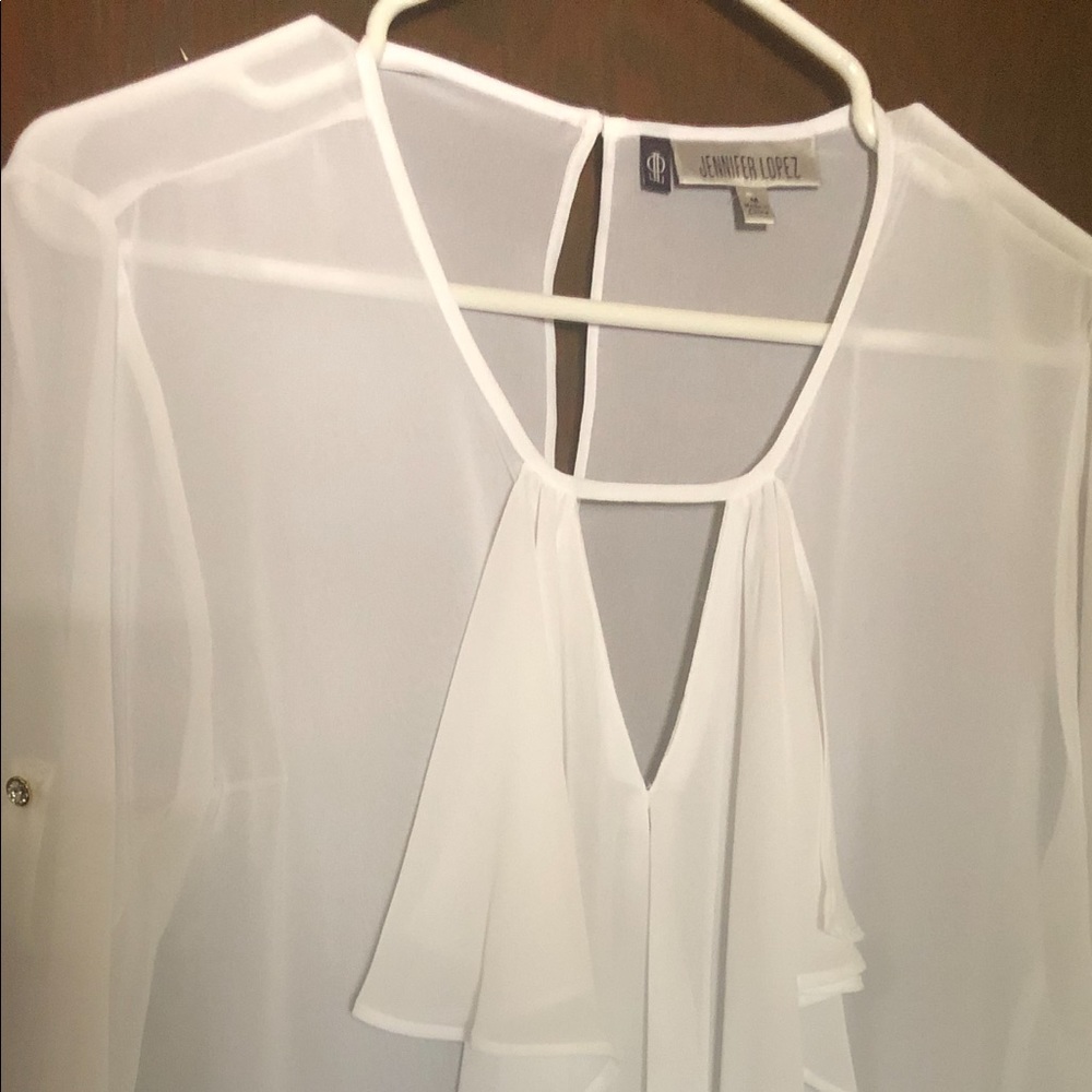 Jenifer Lopez shirt size M .